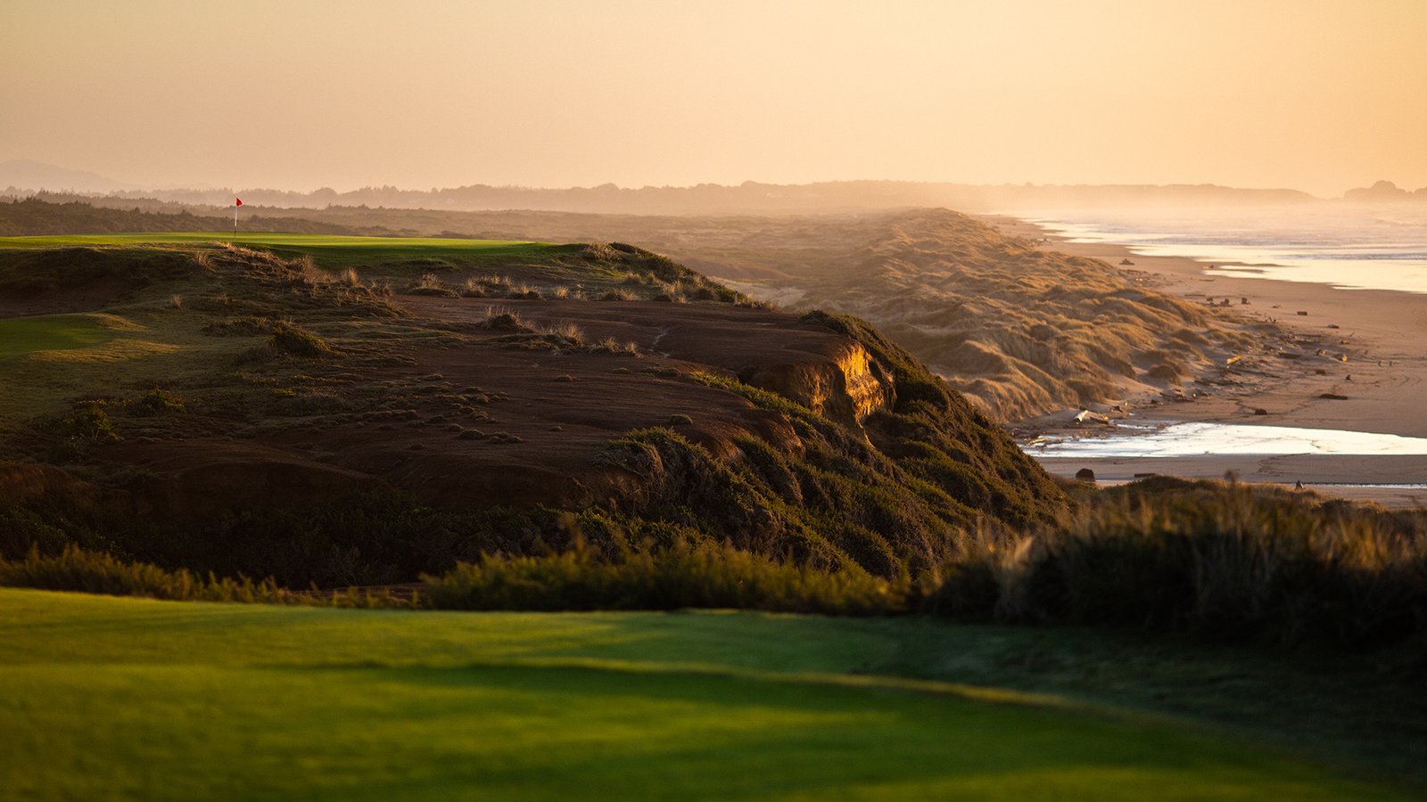 Original Bandon Dunes course layout with native fescue grasses and rolling sand dunes