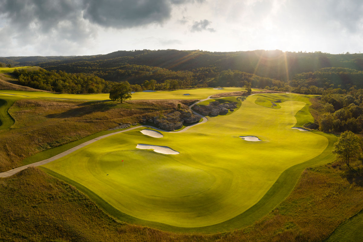 Payne's Valley fairway carving through exposed limestone rock bluffs
